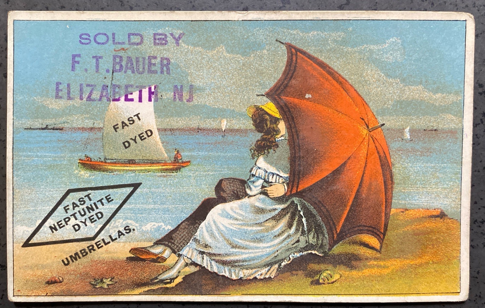c1890’s Trade Card Fast Neptunite Dyed Umbrellas, F T Bauer, Elizabeth NJ