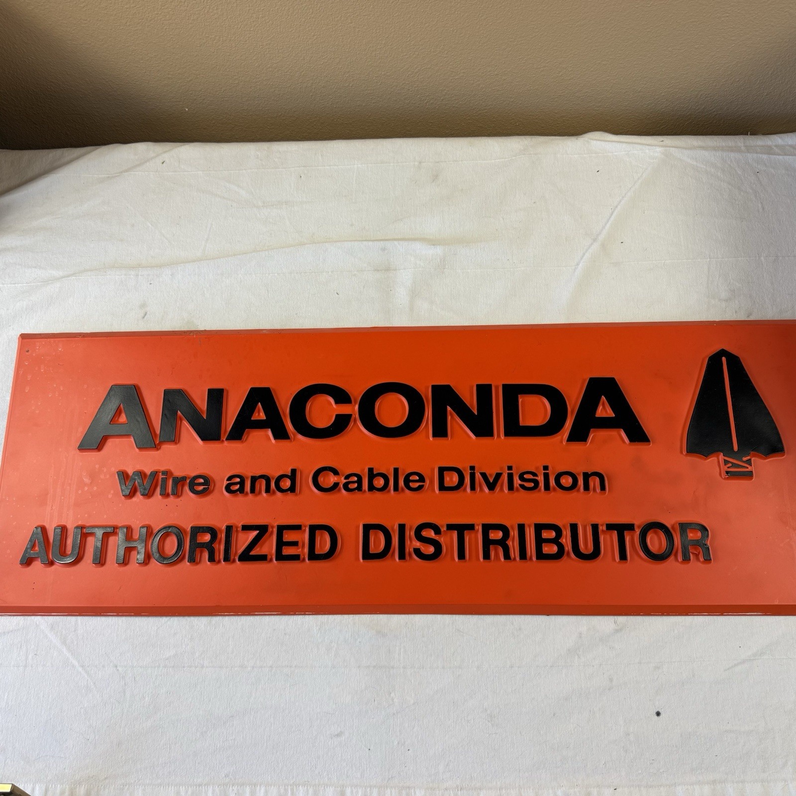 ANACONDA WIRE AND CABLE Division authorized distributor large orange sign 35×12″