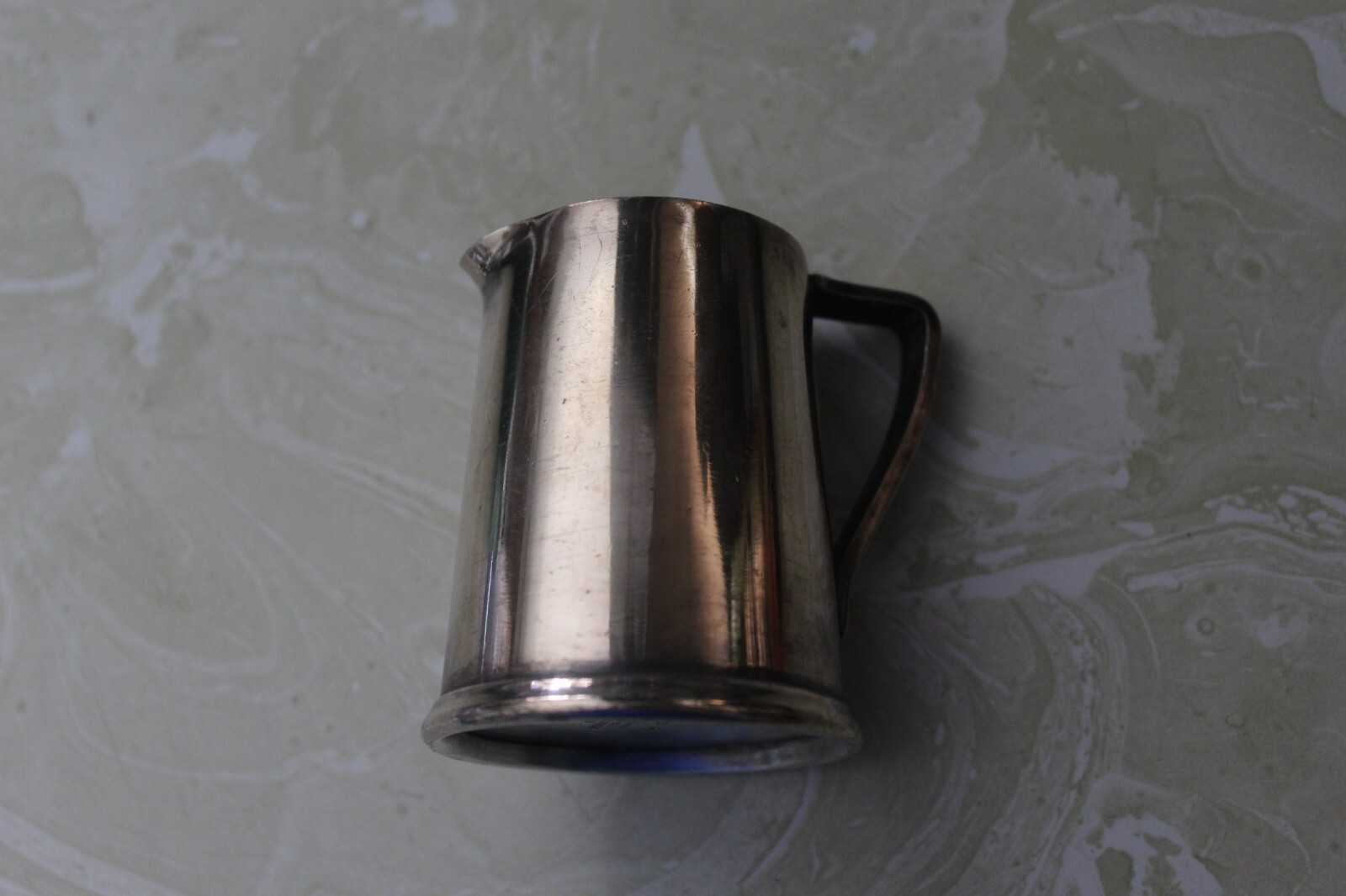 AS FOUND, UNMARKED SILVER SOLDERED HOTEL/RESTAURANT CREAMER