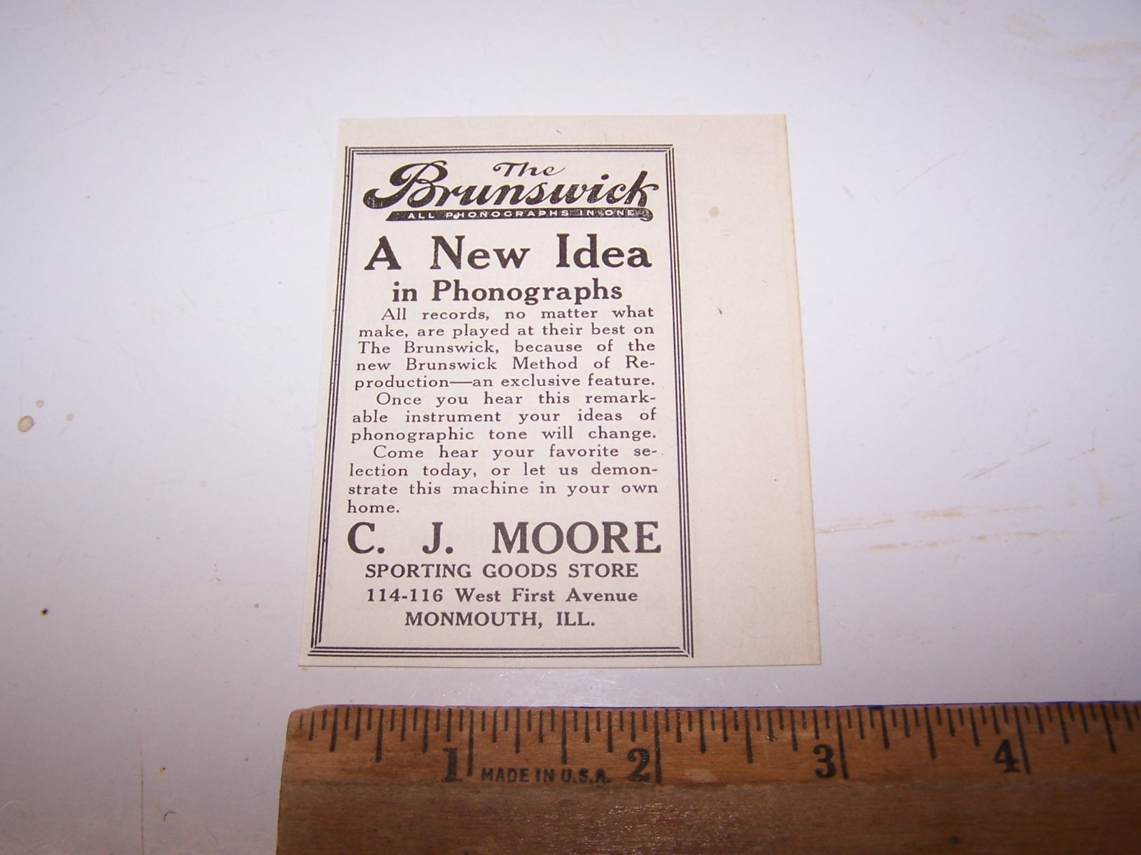 1918 C.J. MOORE SPORTING GOODS – BRUNSWICK PHONOGRAPH Paper Ad MONMOUTH ILLINOIS