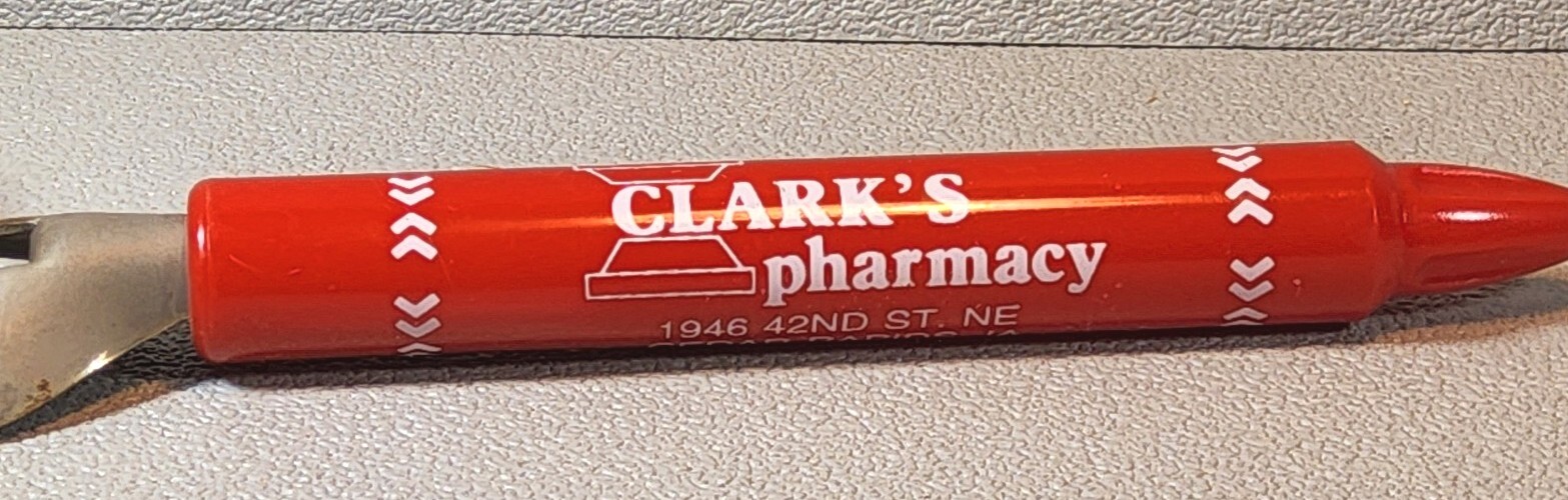 1990 Advertising Can, Bottle Opener – Clarks Pharmacy ~ Cedar Rapids, Iowa. CO-6