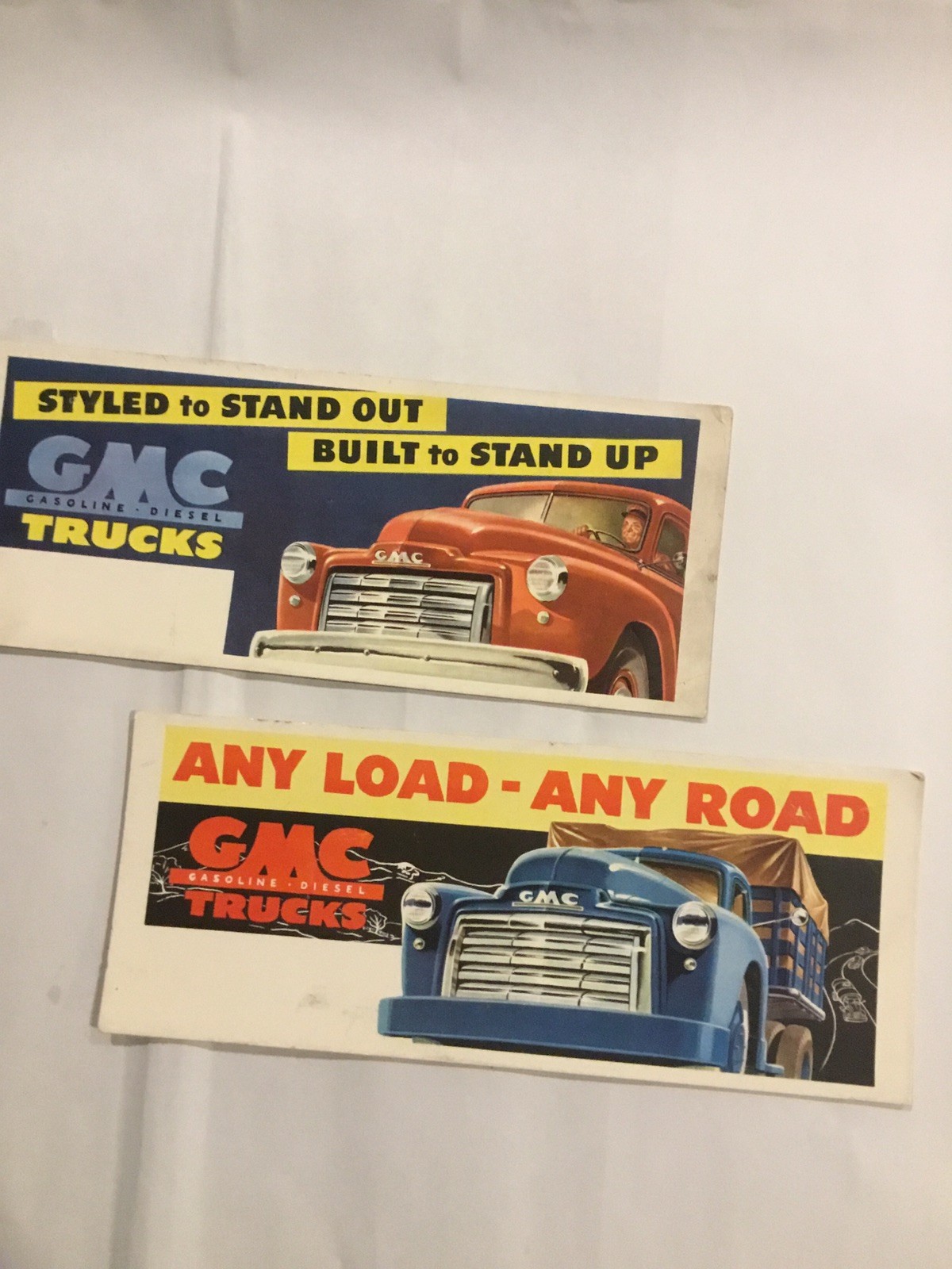 GMC truck advertisements circa light 1940s or early 1950s ink blotters
