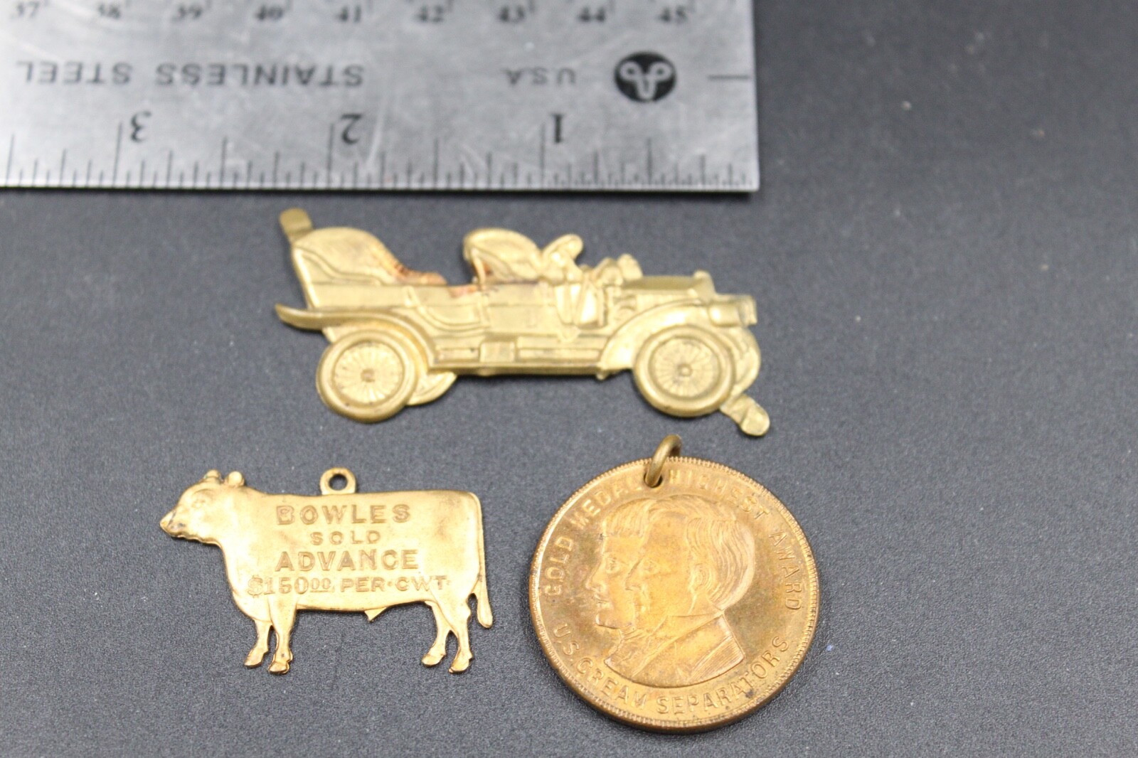 Three Antique Advertising Medallions