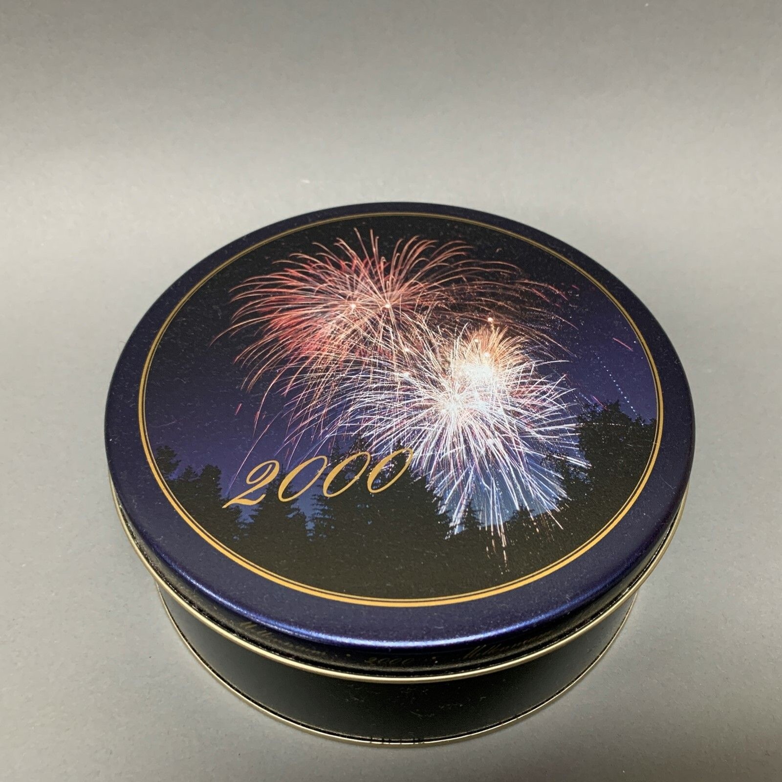 Millennium 2000 Black Blue Multicolor Round Tin Can 7 1/4 across x 2 3/8