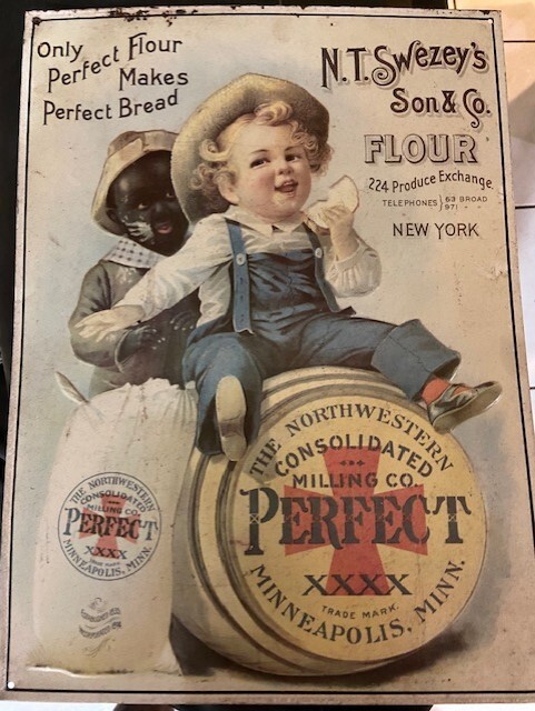 Vintage metal advertising sign for N.T. Swezey’s Son & Co.