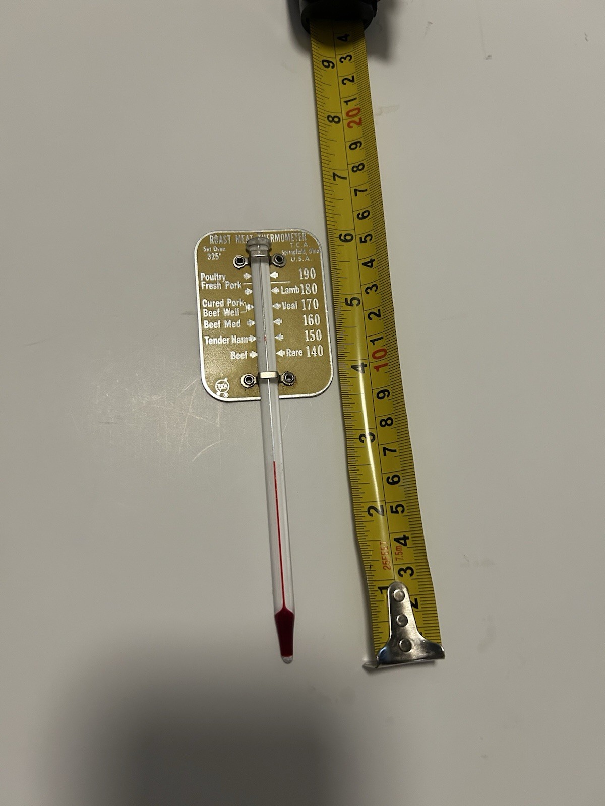A VINTAGE TCA “ROAST MEAT” THERMOMETER WITH ALUMINUM PLAQUE MADE IN USA.