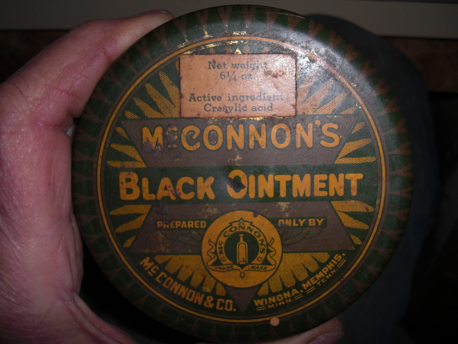 vintage McConnon’s black ointment tin half full Winona Memphis