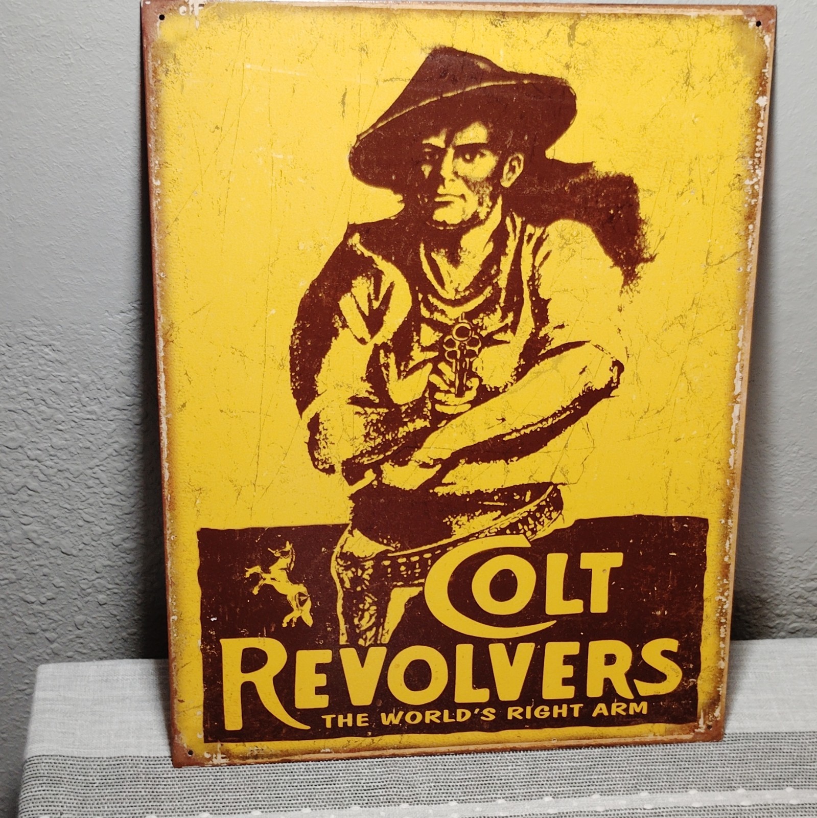 Colt Revolvers “The World’s Right Arm” Advertising Sign Yellow/Brown Repro