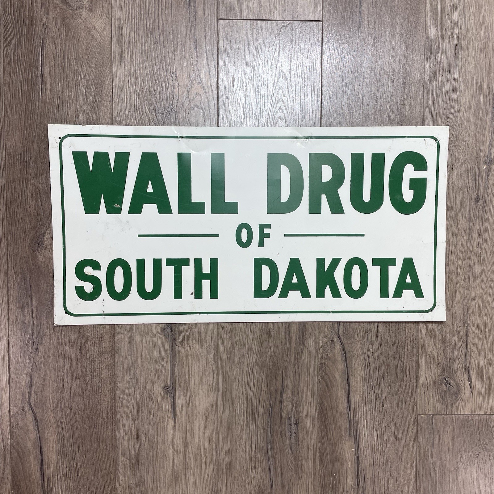 Vintage Wall Drug Of South Dakota Metal Tin Wall Sign Size 24”x 12” White Green