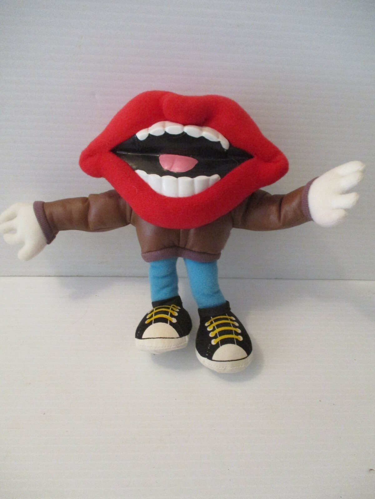 1990 Tang Lips Beverage 8 inch General Food Stuffed Lips Brown Jacket Poseable