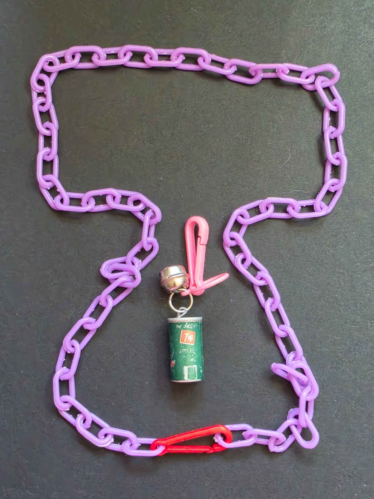 Vintage 1980s Plastic Bell Necklace purple chain necklace with a 7-up charm