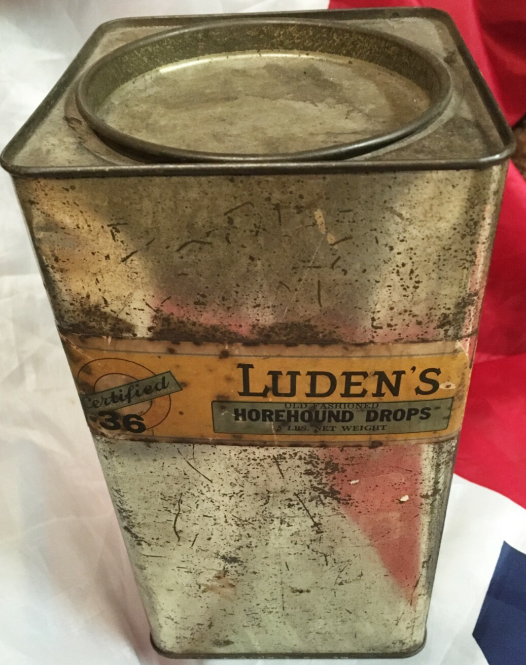 Advertising Print on 8″ tall TIN CONTAINER Luden’s Horehound Drops