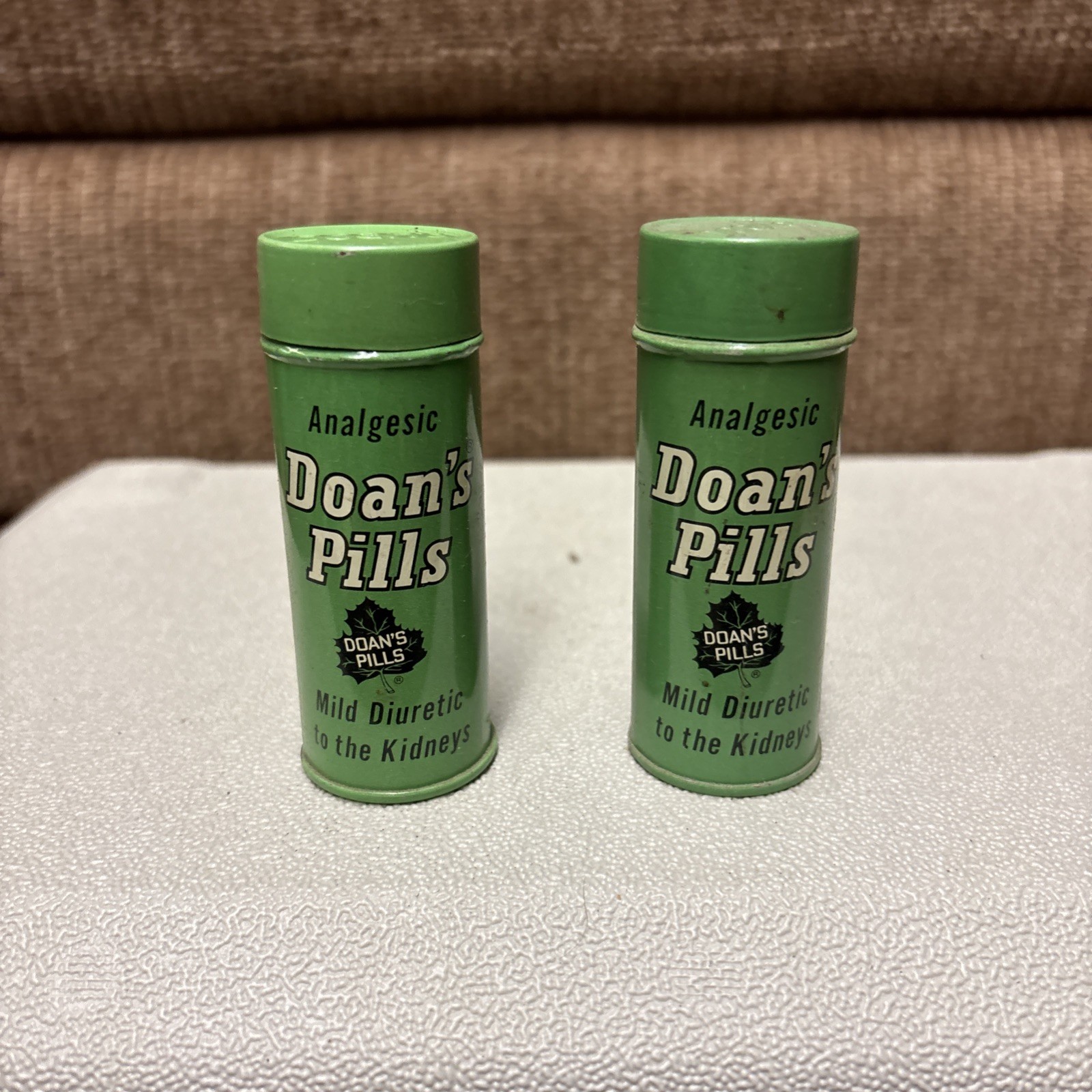 2 Doan’s Pills Tin Green. Empty