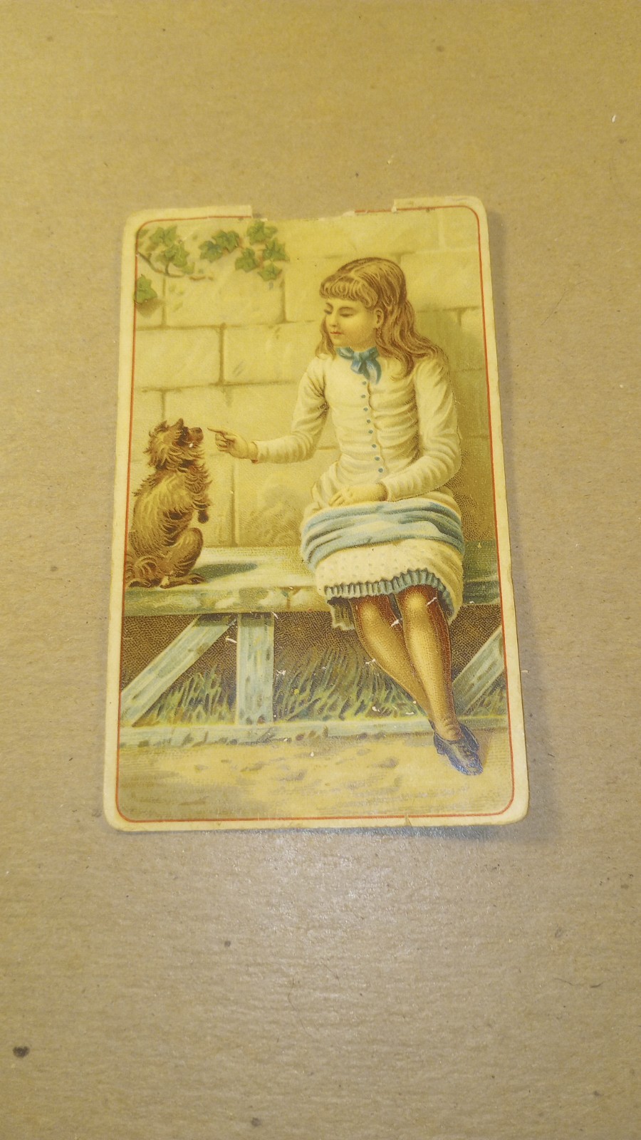 Antique Arbuckle’s Ariosa Coffee Trade Card No.85 – Girl with Dog on Bench
