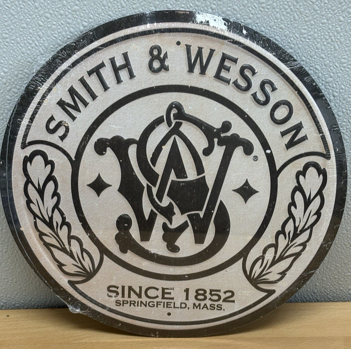 Smith & Wesson 11.5″ Metal Sign. Made in USA New Sign. Aged Design.
