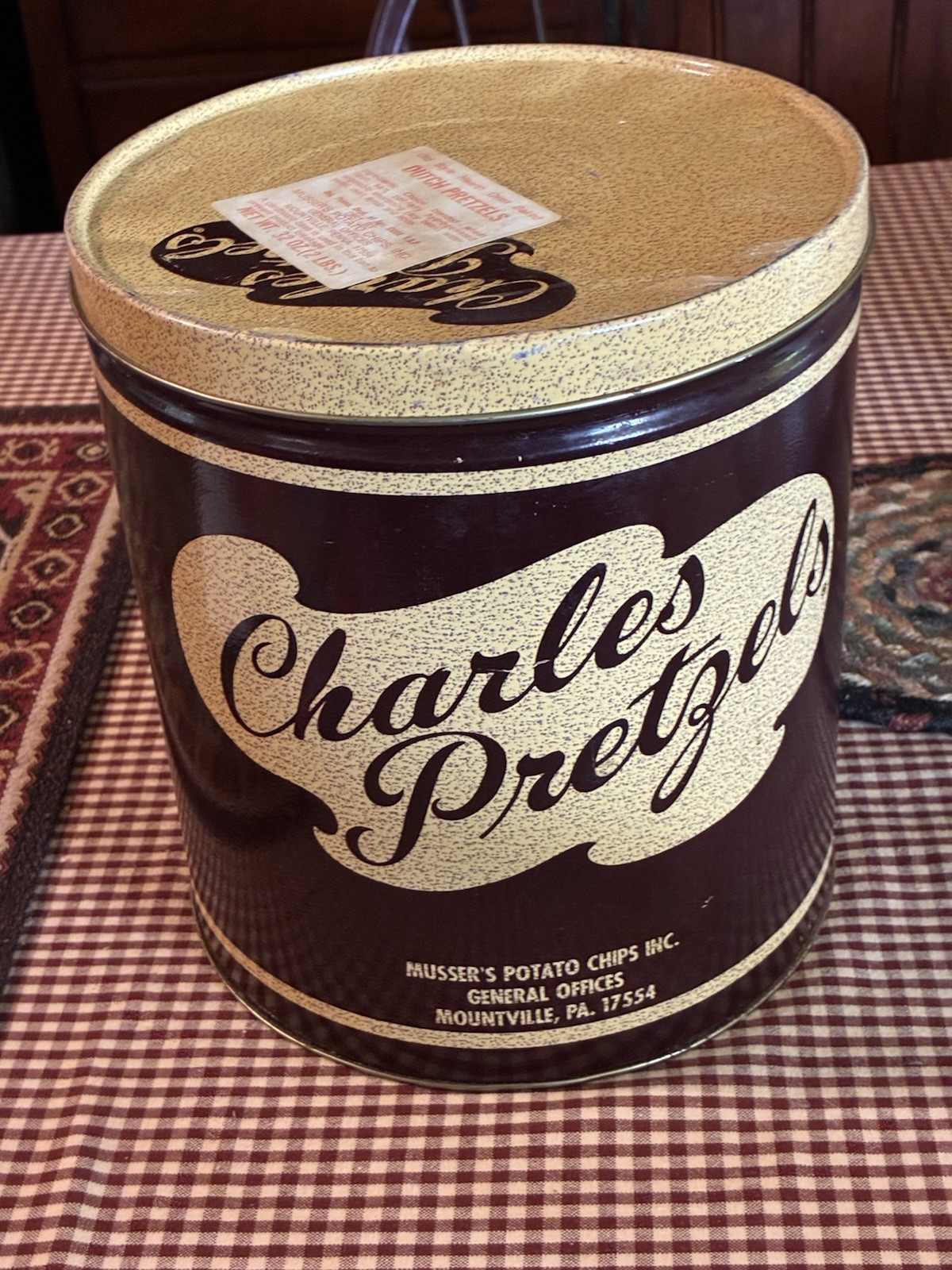 Vintage Charles Chips round metal tin with lid, featuring brand logo. 32 oz