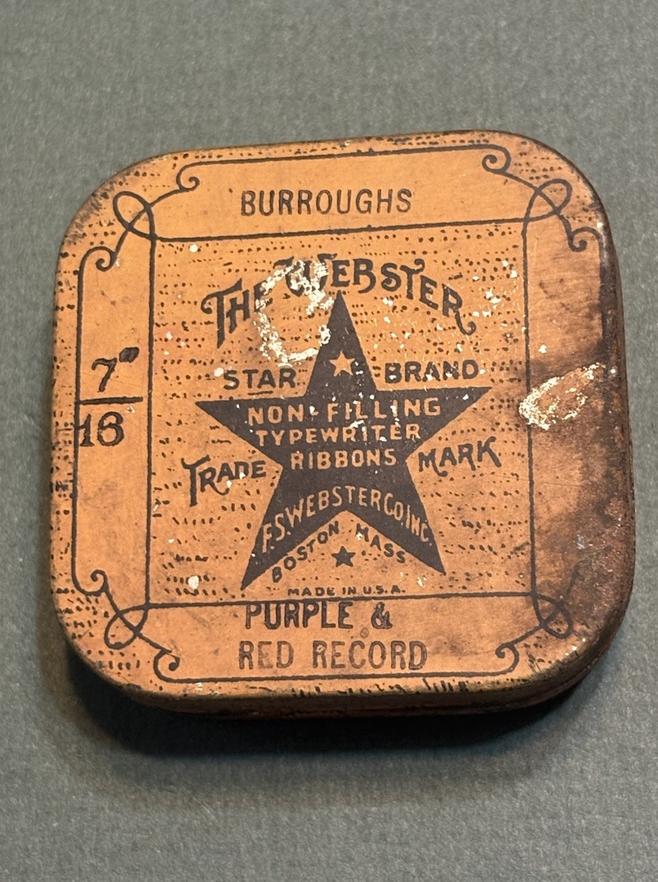 The Webster Typewriter Ribbon tin with ribbon. Early 1900s