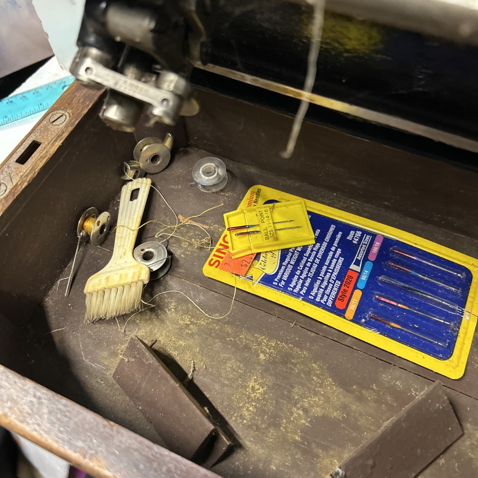 The Singer Manufacturing CoVintage Singer Sewing Machine With Light And Cabinet