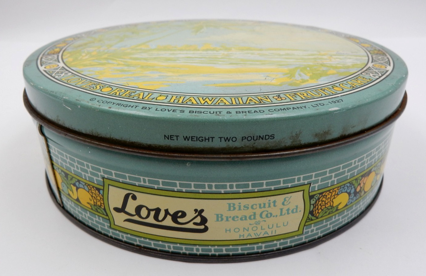 VINTAGE LOVE’S BISCUIT & BREAD CO. HONOLULU HAWAII 1927 ART DECO. FRUITCAKE TIN