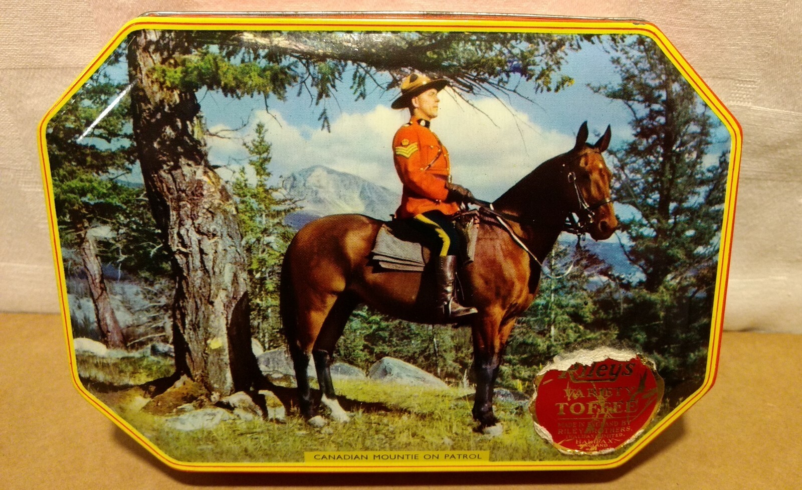 Canadian Mountie Color Photo on Tin Can Box from Riley’s Toffee Vintage