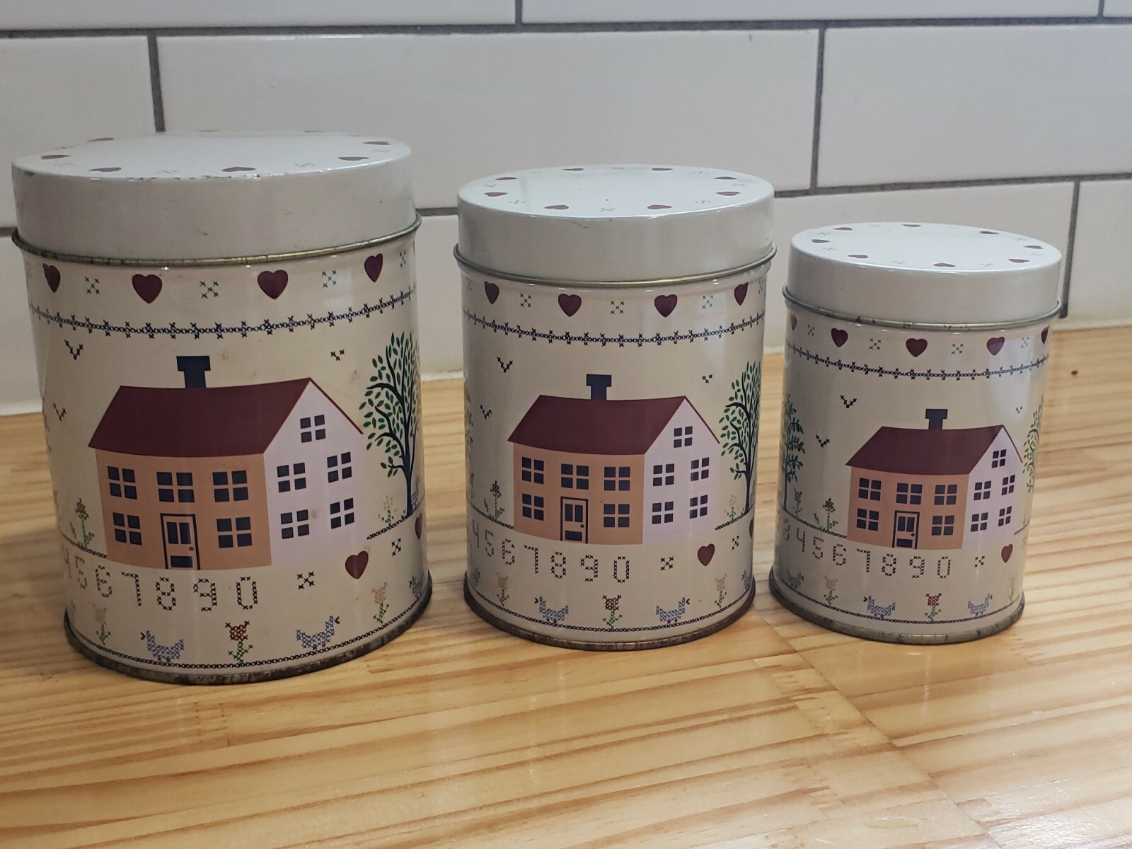 Set Of 3 Tin Nesting Canisters Country Life Farm House Apple Trees Hearts VTG