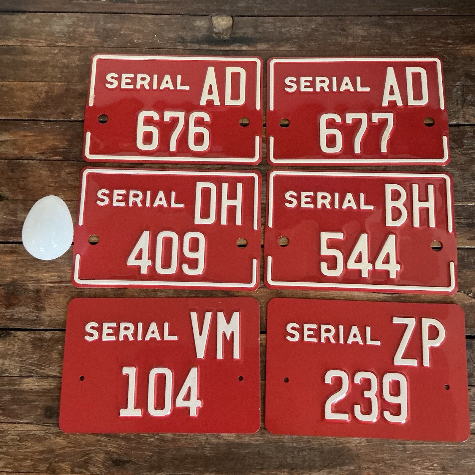 Six Authentic Old Embossed Heavy Steel Designation Signs