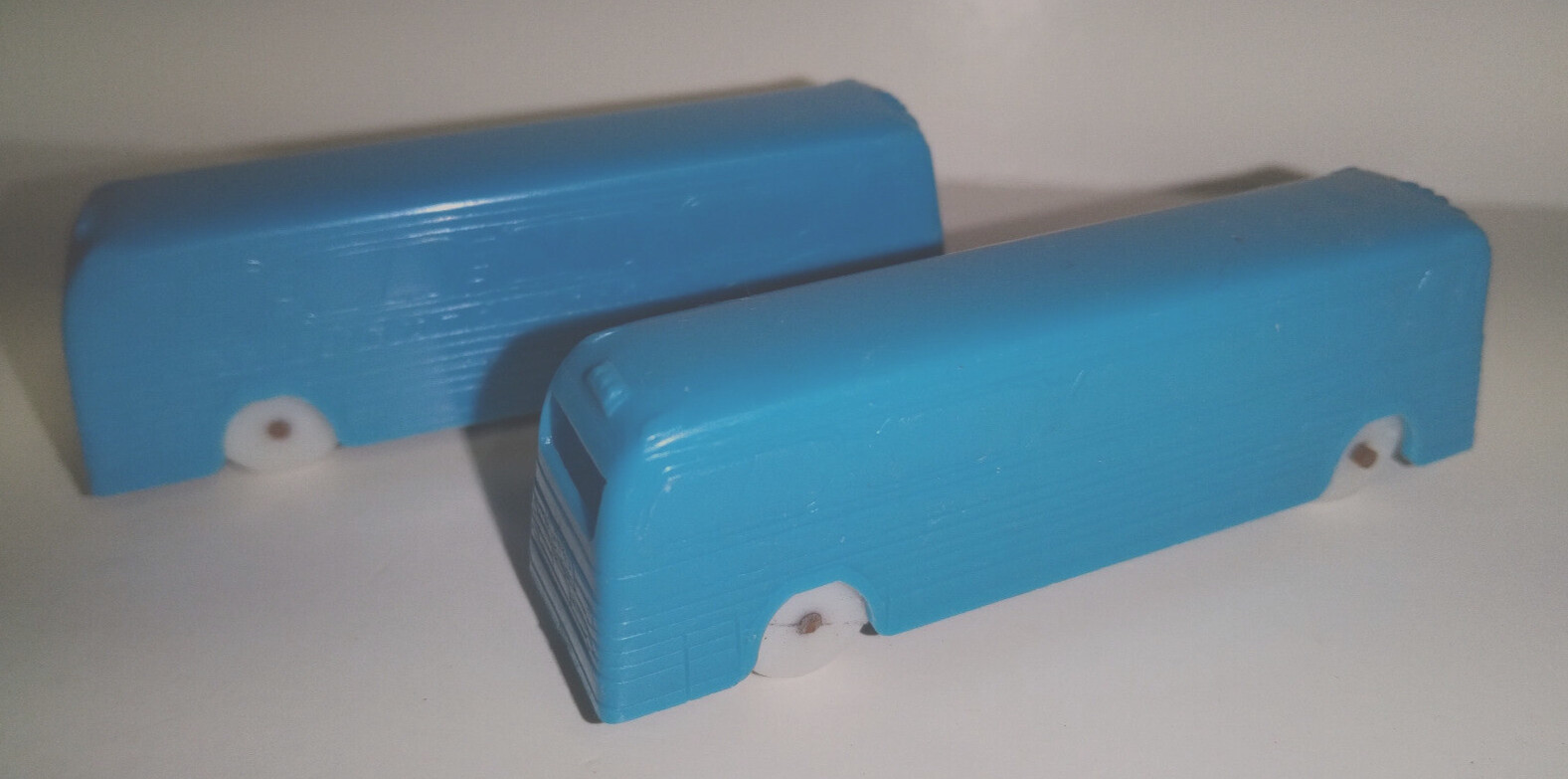 F & F MOLD DAYTON, OH – 2 CEREAL TOY PREMIUMS GREYHOUND BUS