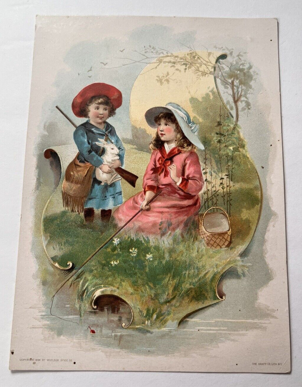 Vintage 1894 Victorian Trade Card Woolson Spice Co. Lion Coffee Girl Fishing