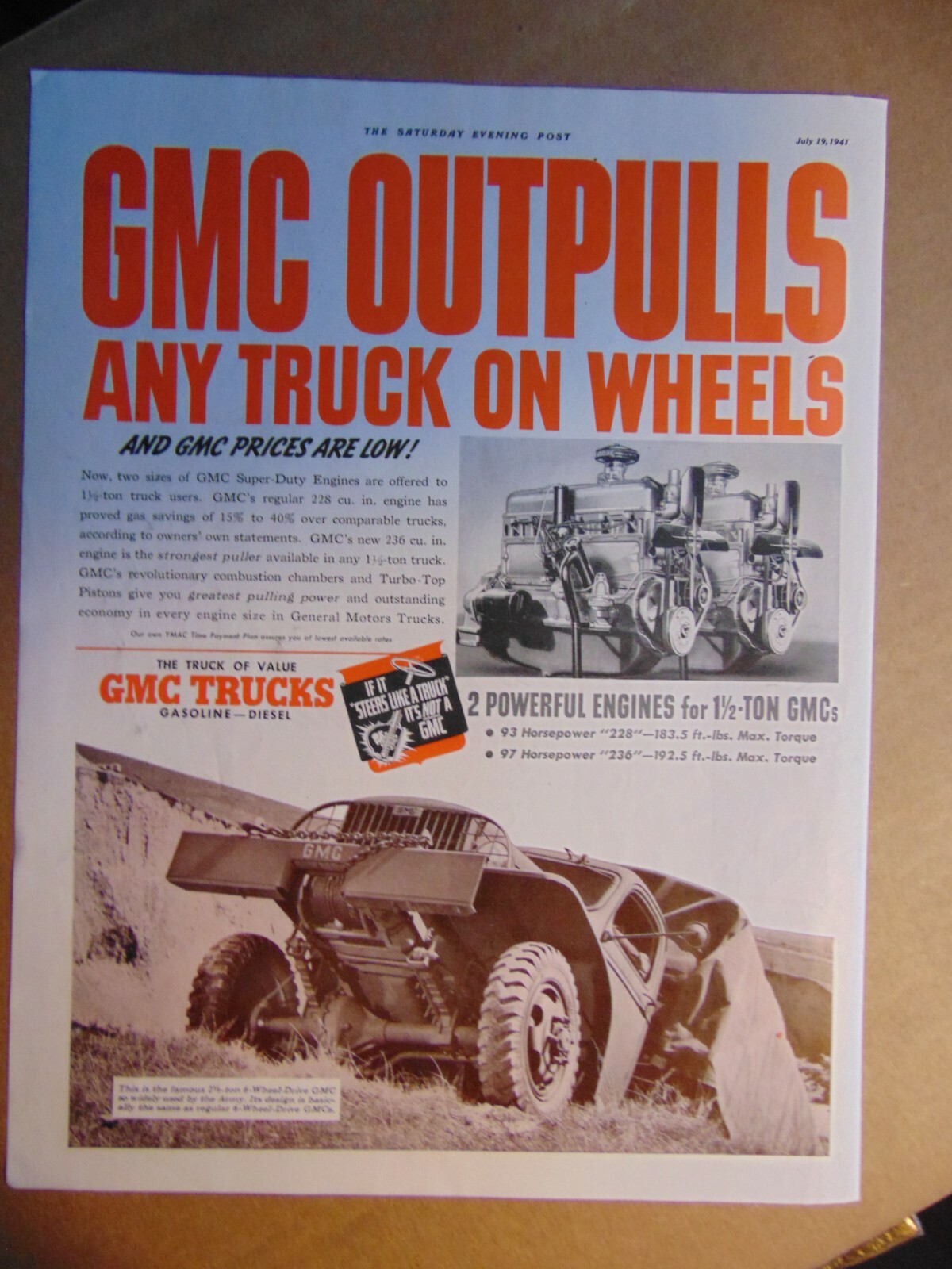 1941 GMC Outpulls any truck on Wheels! vintage art print ad