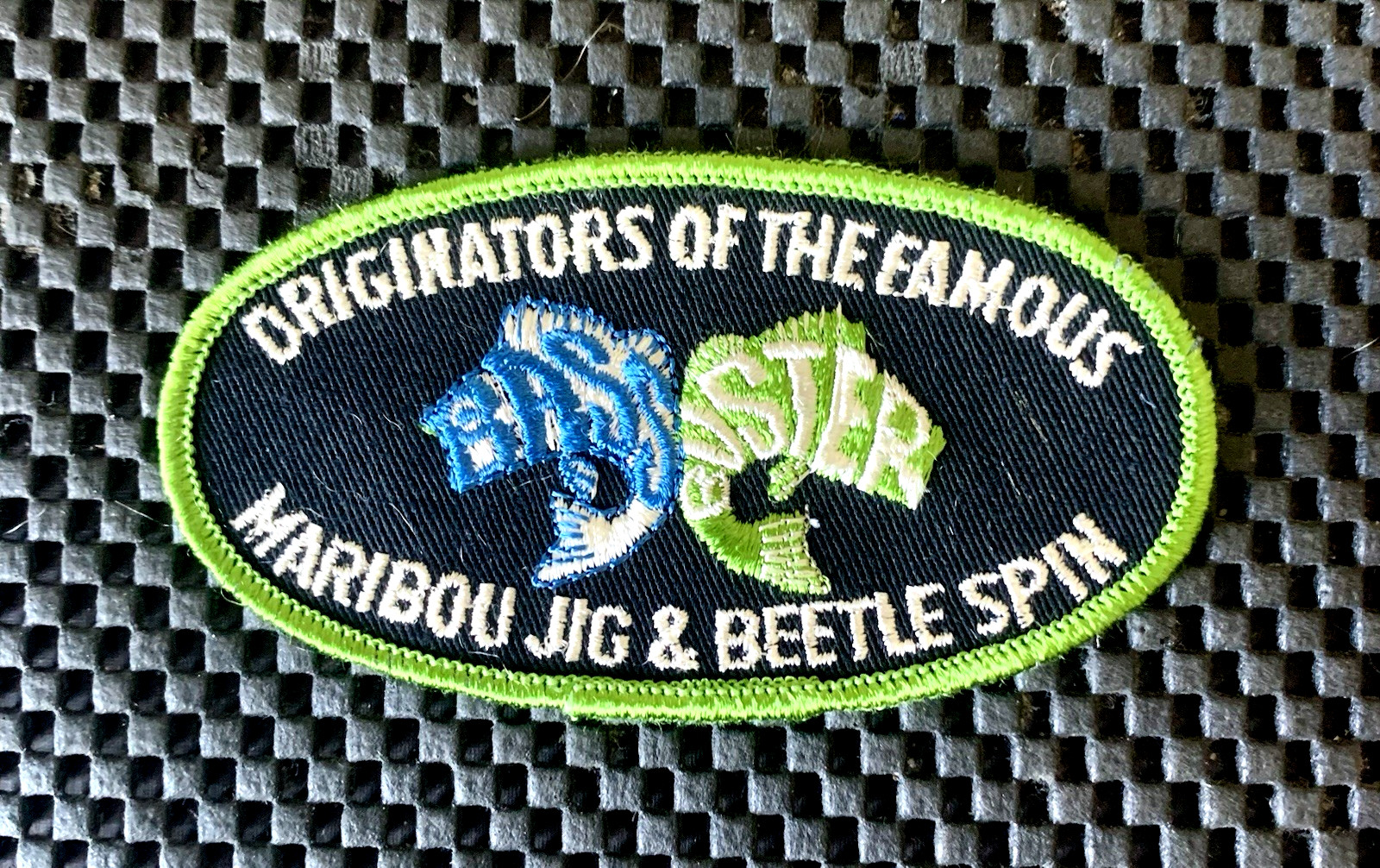 BASS BUSTER ORIGINATORS OF THE FAMOUS MARIBOU JIG SEW ON PATCH 4 1/4 x 2 1/4 NOS