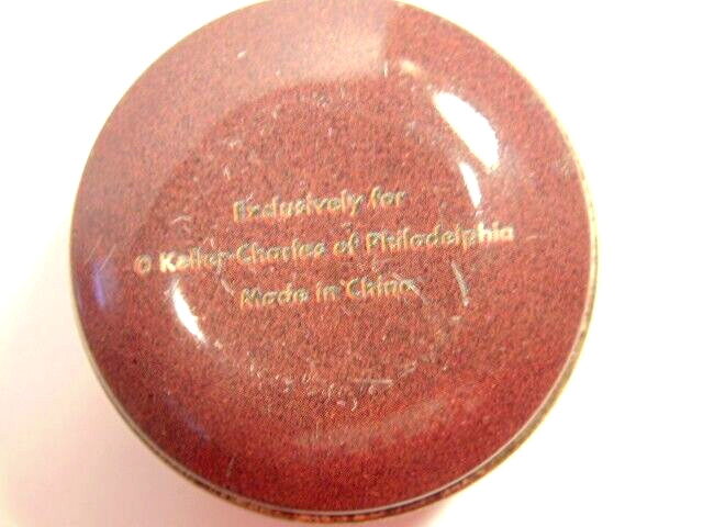 small empty “Keller -Charles of Phila” metal tin showing golf balls & tees