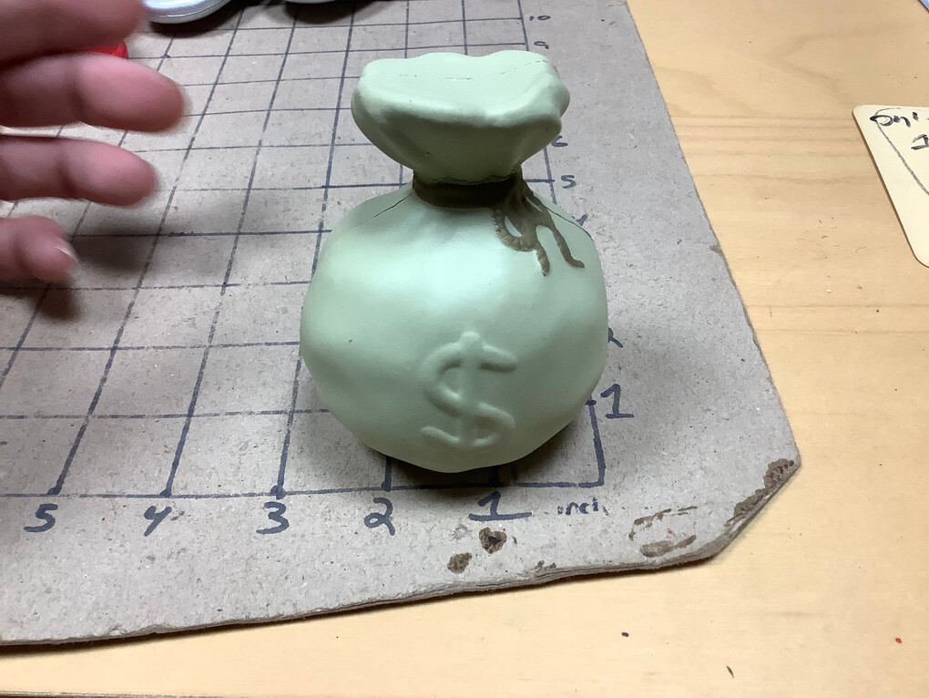 Squeezable Stress Reliever: BAG OF MONEY – focused investments