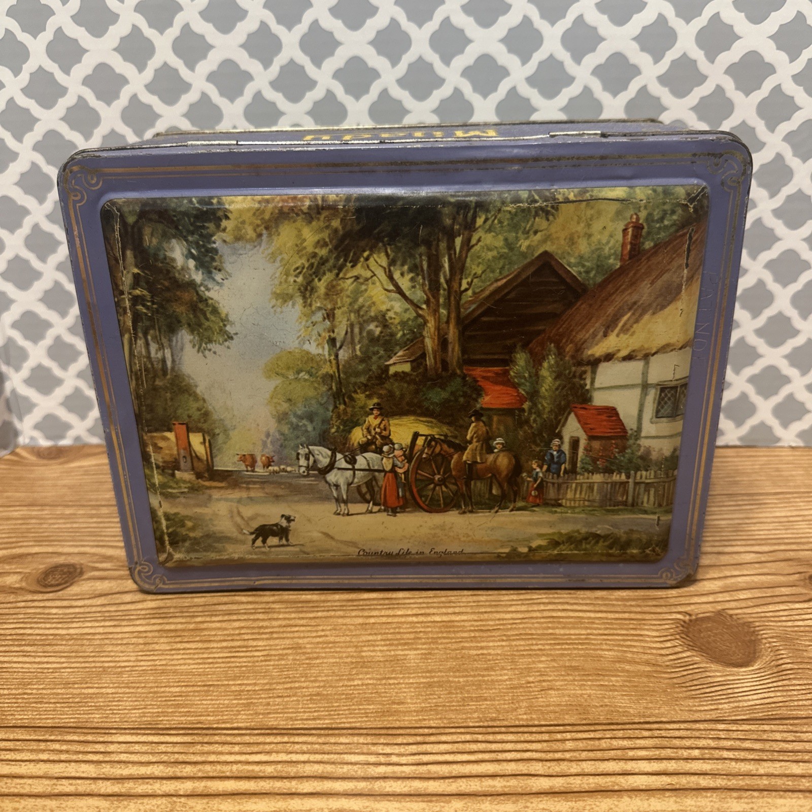 Vintage Milady hinged carmel tin with victorian scene 9 1/2 x 7 1/4 x 4 inches