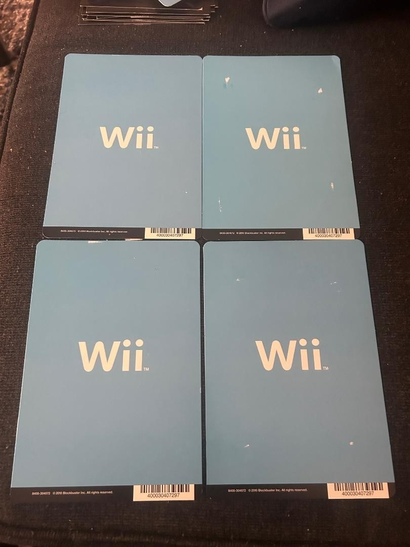 (4) Nintendo Wii Blue Blockbuster Game Display Backer Cards