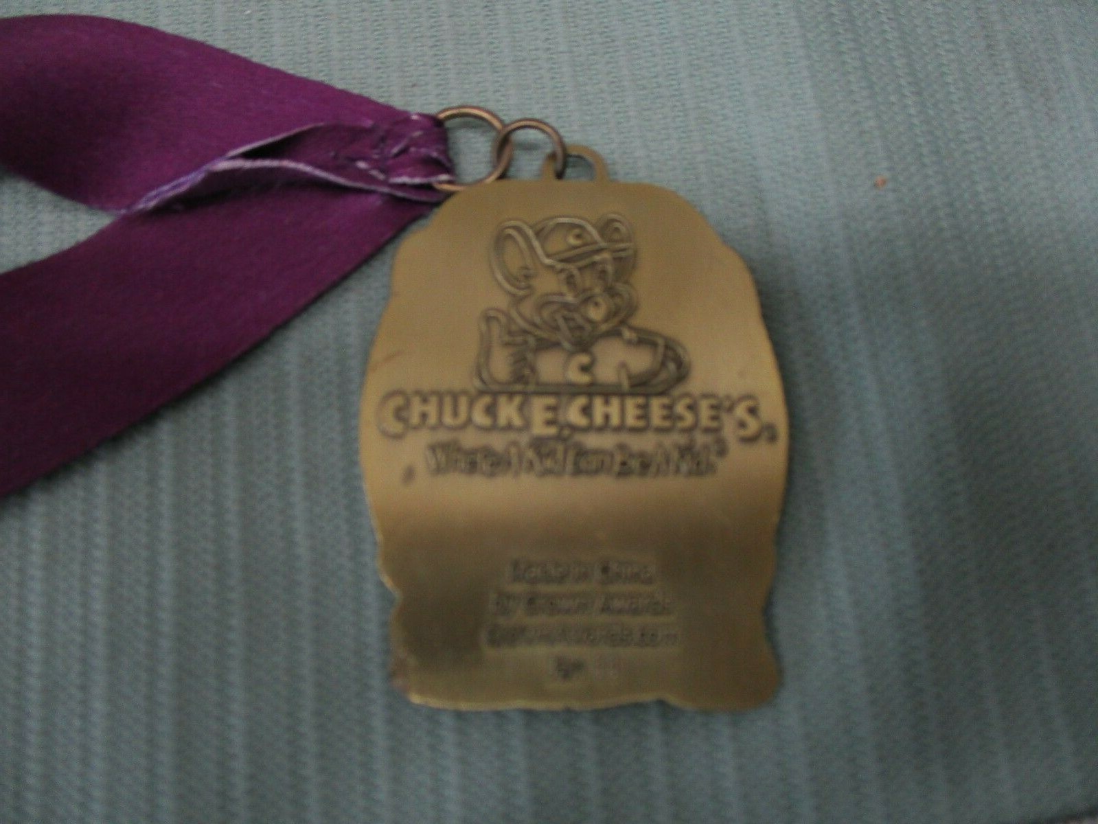Chuck E Cheeses Birthday Star Necklace Brass Medal Purple Band Clip Medallion