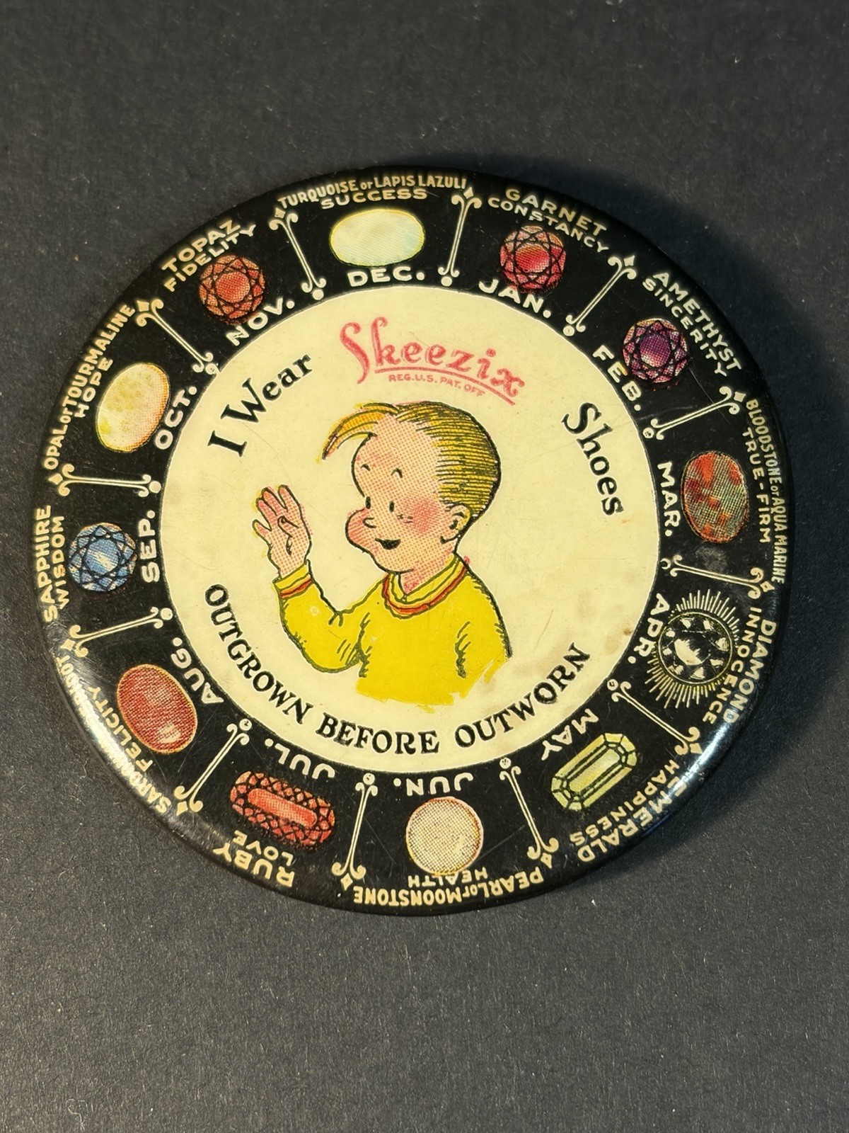 1920s I Wear Skeezix Shoes Birthstone Advertising Celluloid Pocket Mirror