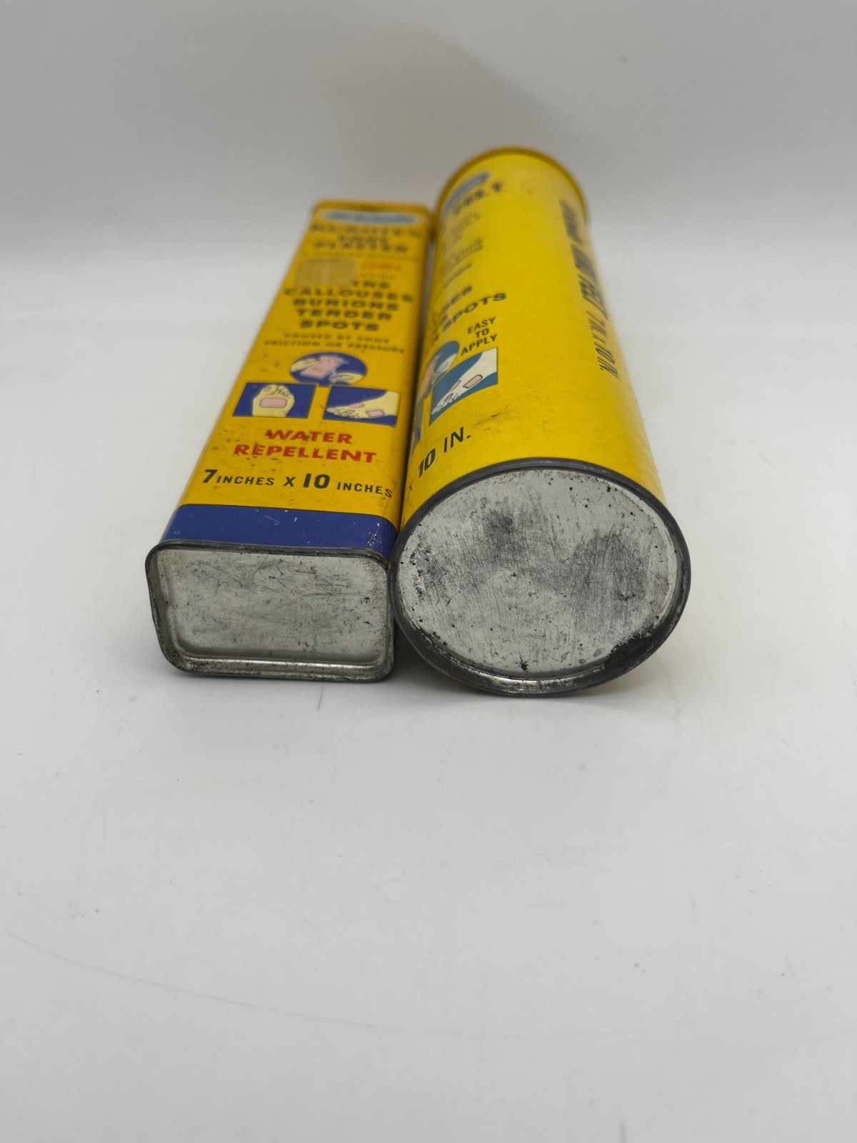 TWO Vintage Dr Scholls Empty 8″ Advertising Tins Kiro Felt & Kurotex with Lids