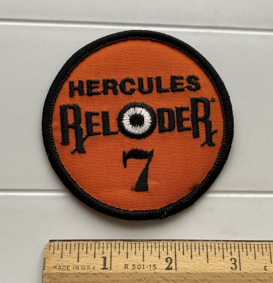 Hercules Reloder 7 Rifle Gun Powder Orange Black Round Embroidered Patch Badge
