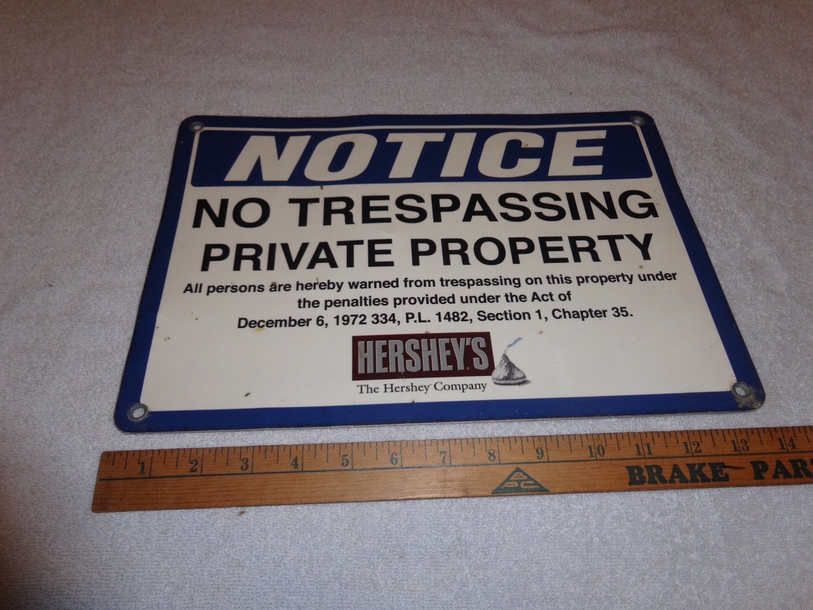 VINTAGE ANTIQUE ORIGINAL THE HERSHEY COMPANY +HERSHEYS KISS 14″ X 10″ METAL SIGN