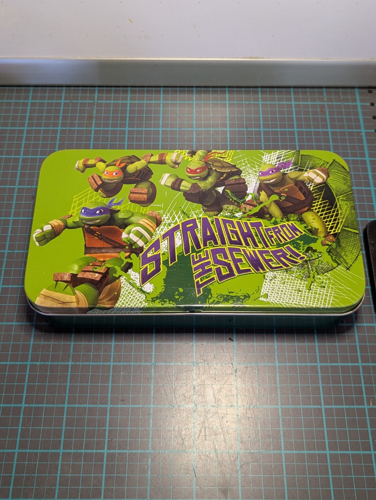 TMNT Nickelodeon Metal Tin Box W Hinges “Straight From The Sewer!” 4”x8”x1.75″