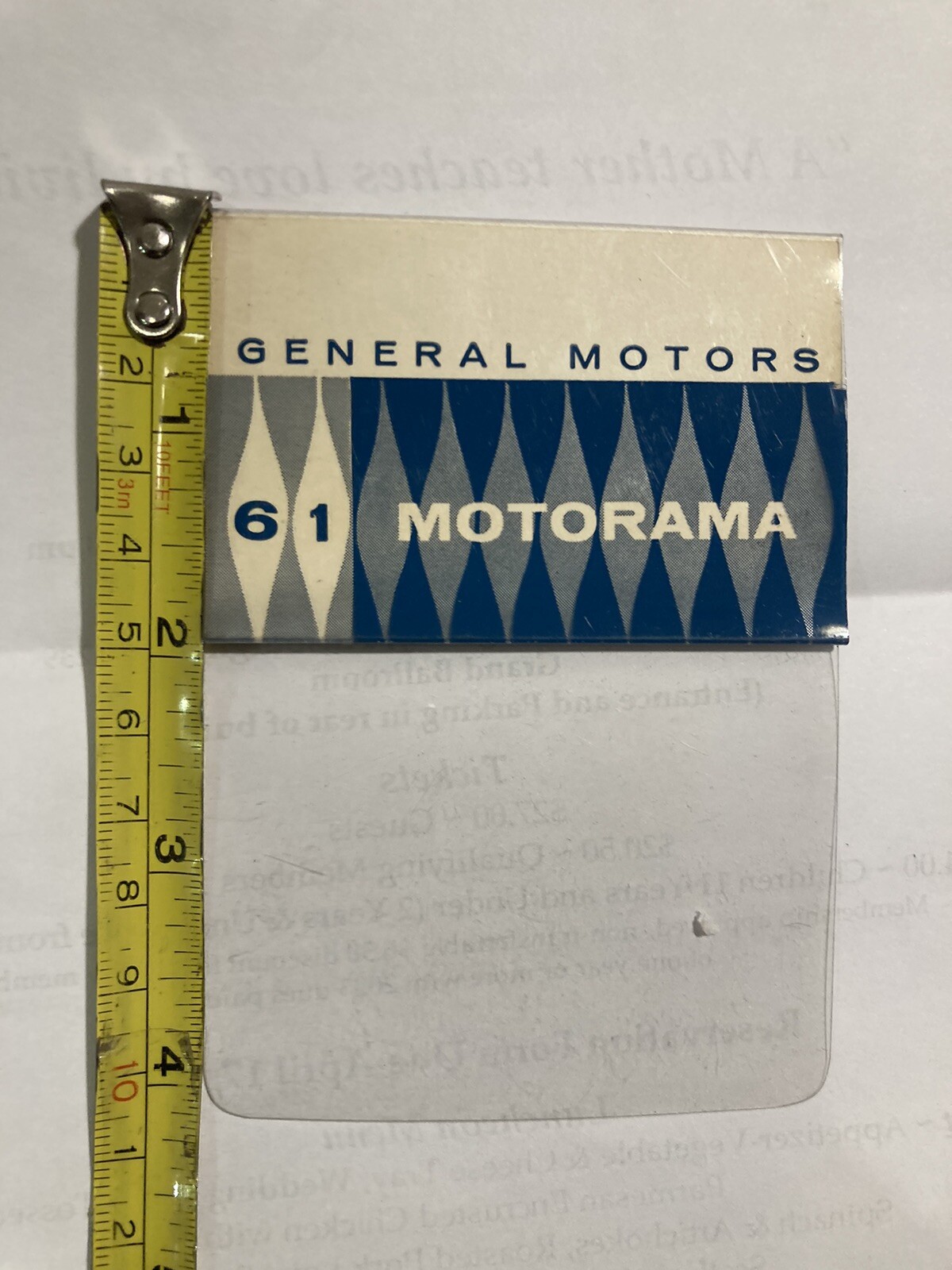 VINTAGE MOTORAMA 1961 GENERAL MOTORS 61 PLASTIC POCKET TAG – DEALER SHOW