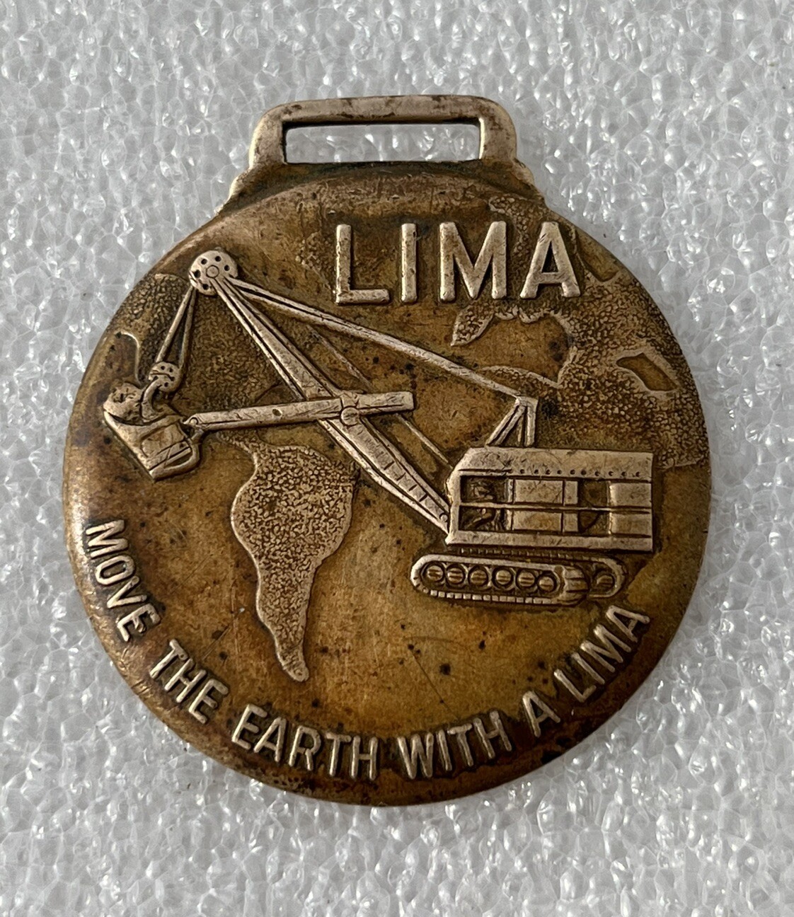 Medallion Lima OH Smith Booth Usher Co. Clamshell Shovel Earth Mover Badge Fob
