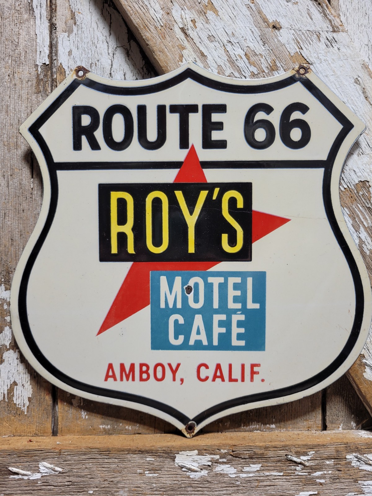 VINTAGE ROYS MOTEL PORCELAIN SIGN OLD ROUTE 66 HOTEL AMBOY CALIFORNIA 12″ SHIELD