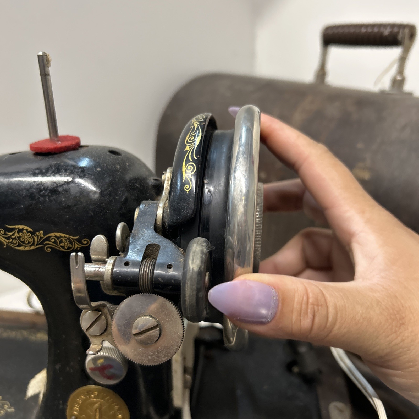 The Singer Manufacturing CoVintage Singer Sewing Machine With Light And Cabinet
