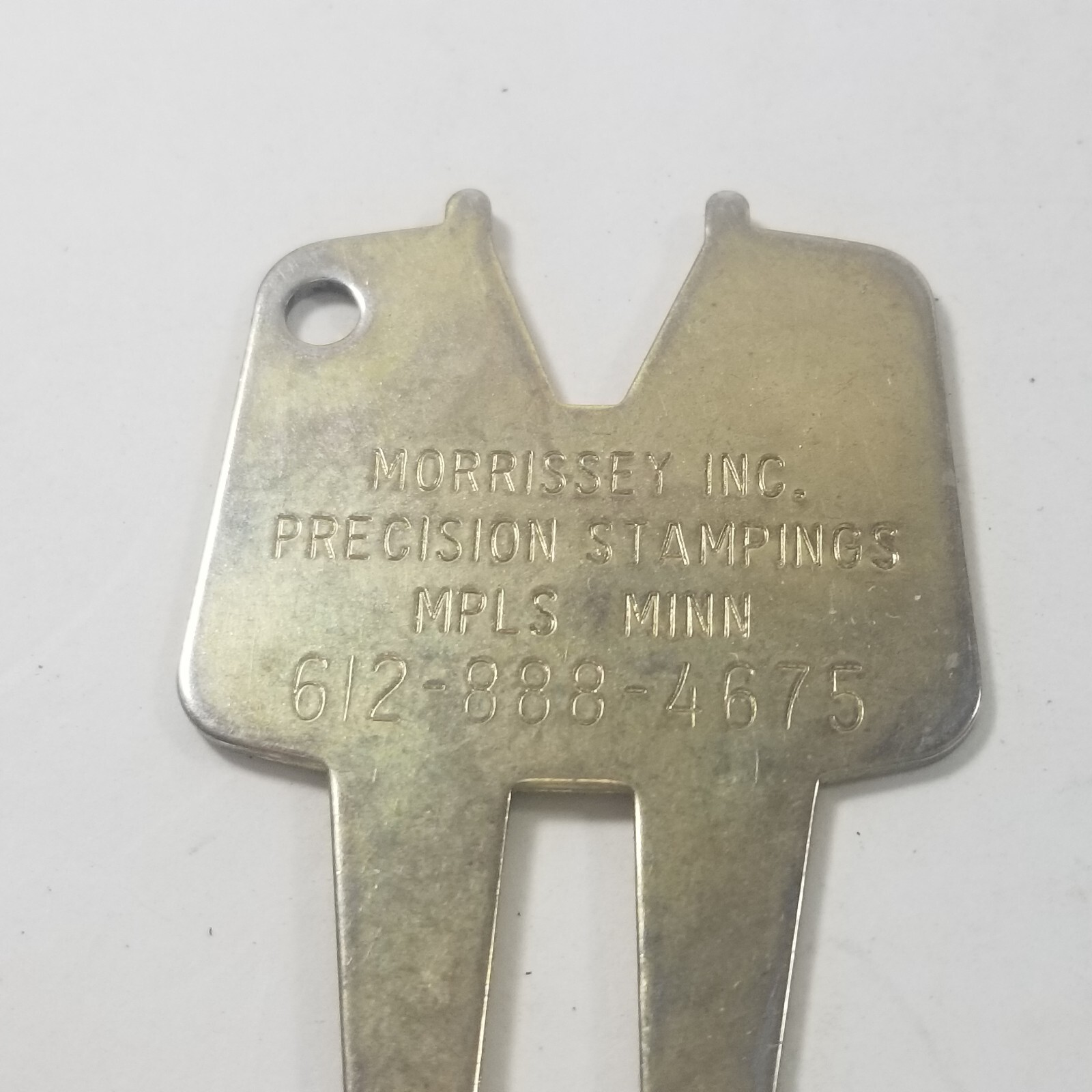 MORRISSEY INC. Precision Stampings Golf Divot Tool.