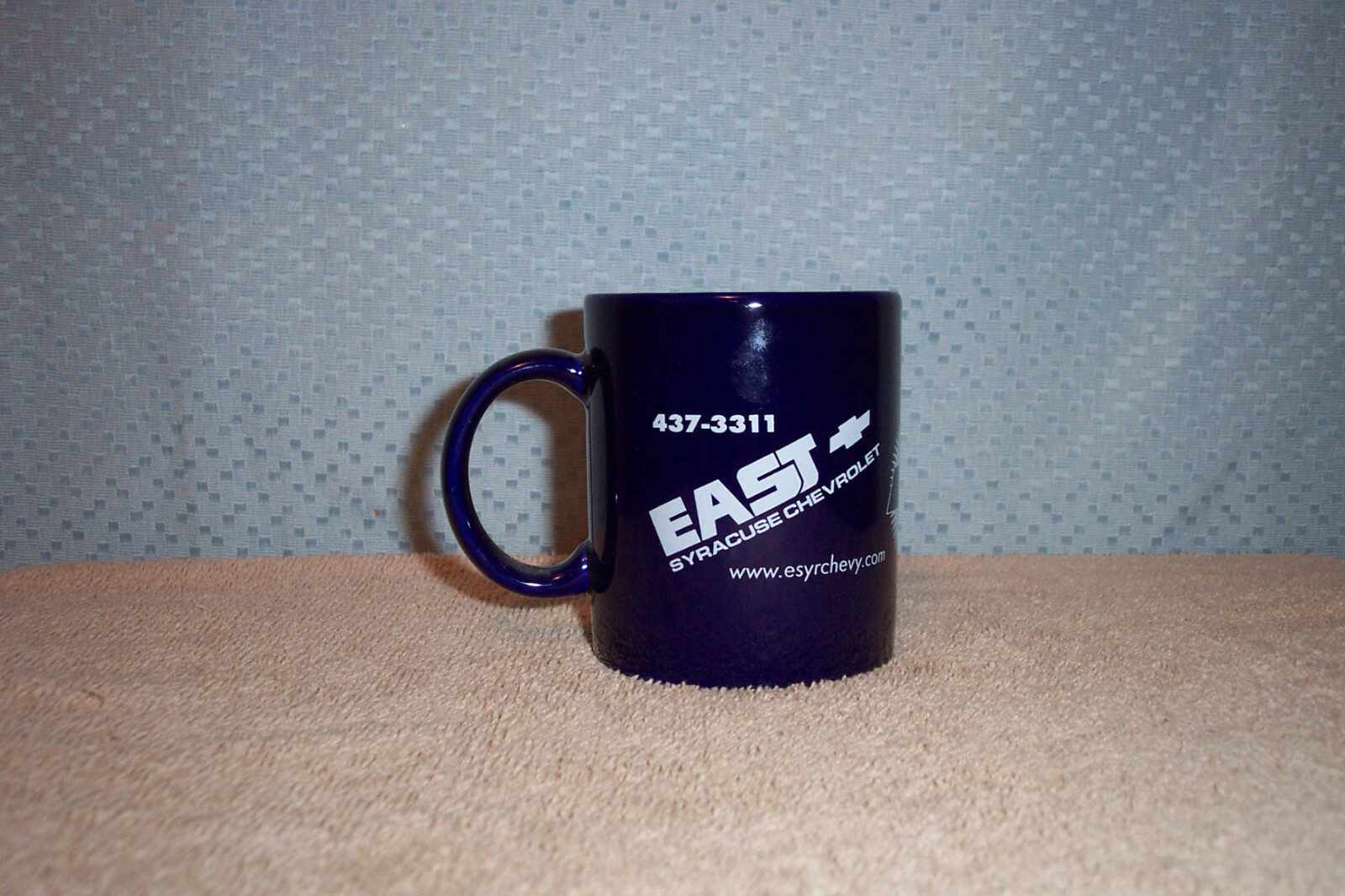 1999 COBALT BLUE CERAMIC COFFEE MUG, CUP EAST SYRACUSE CHEVROLET 70 YRS SERVICE