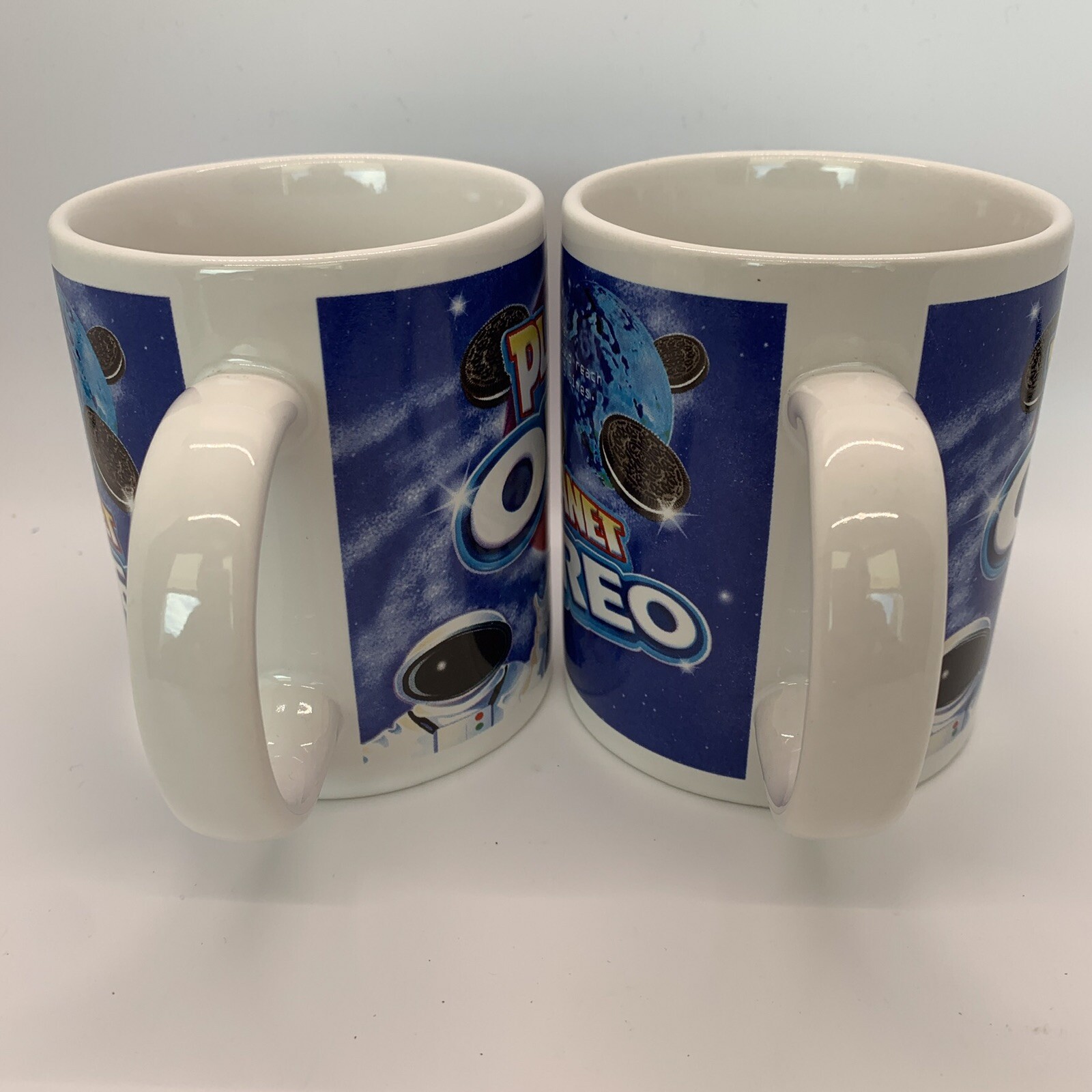 Nabisco Planet Oreo Cookie Astronaut Alien Space Coffee Tea Cup Mug Set of 2