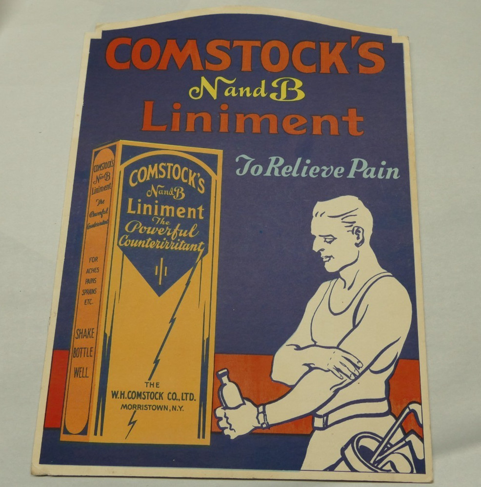 old country store display cardboard advertising display sign Comstock’s liniment