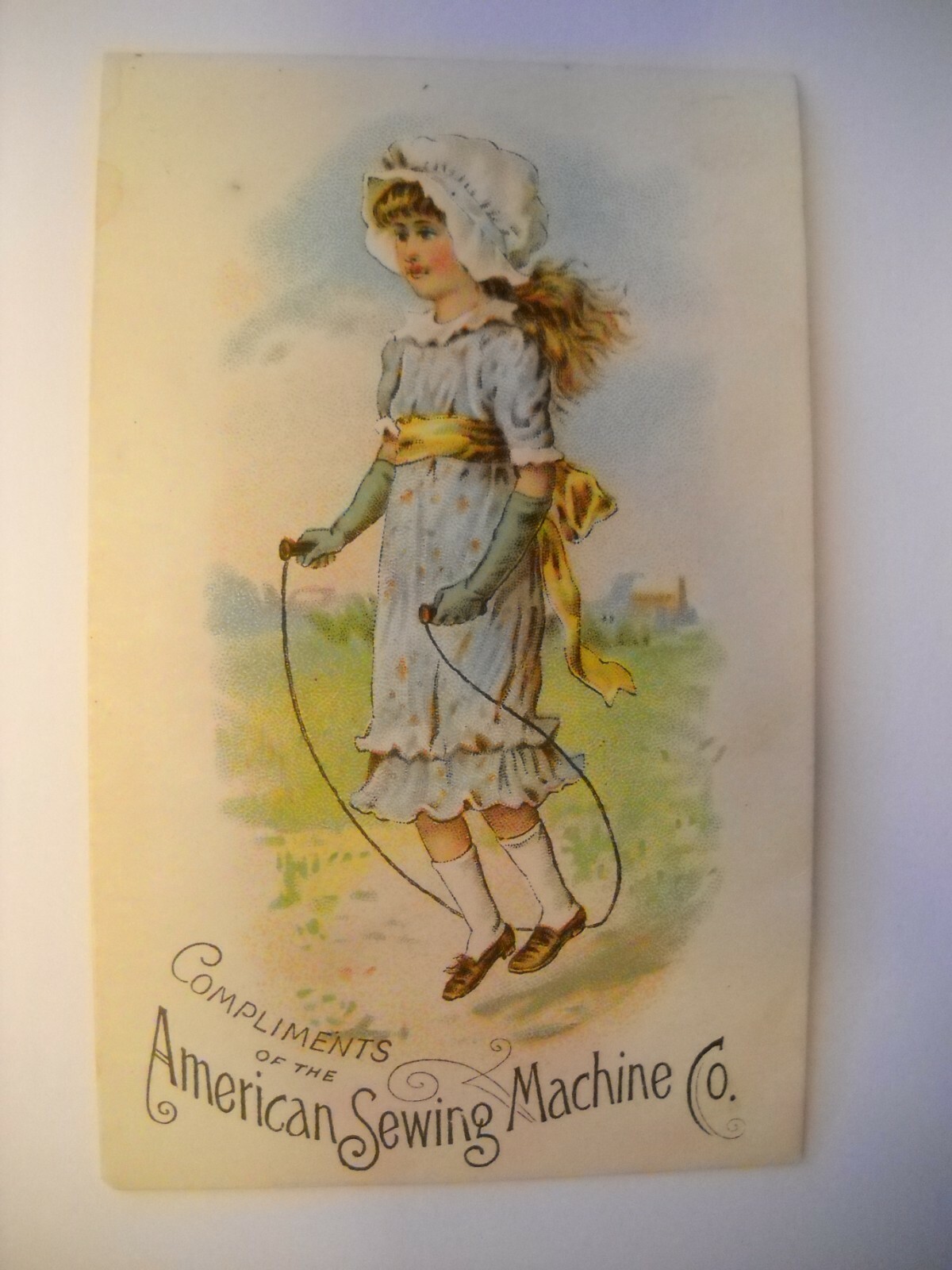 AMERICAN SEWING MACHINE Victorian trade card CHROMOLITHOGRAPH girl jumping rope