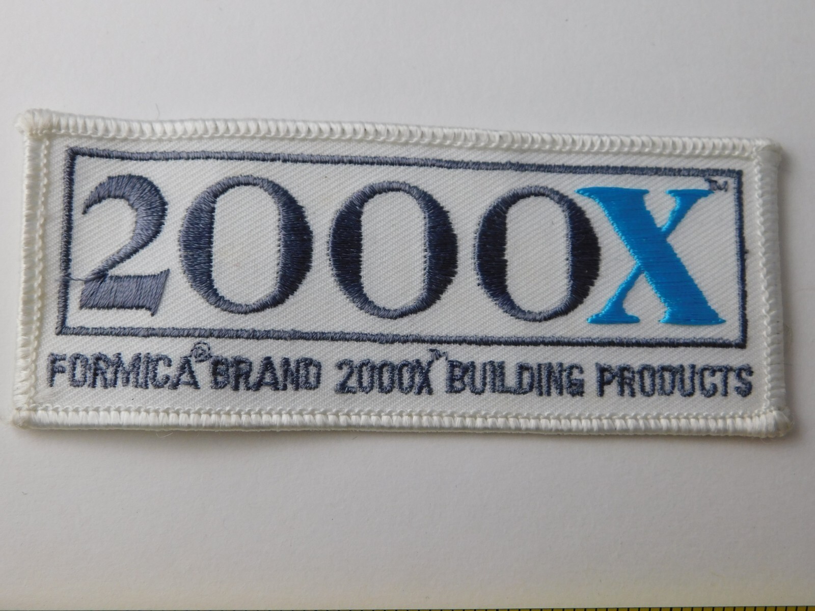 20000X FORMICA BRAND BUIDING PRODUCTS COMPANY PATCH EMPLOYEE BADGE ADVERTISING